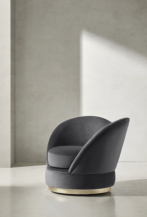 Las formas curvas del sillón Blooms diseñado por Soraya Pla son sello de identidad de la línea de muebles contemporáneos de lujo Evolution de la fábrica española Colección Alexandra.