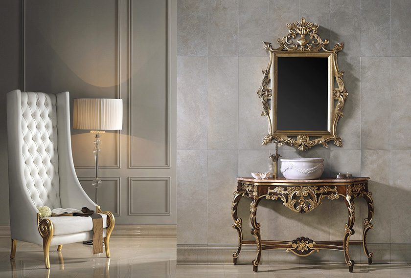 High end Victorian style giltwood bathroom vanity with marble washbasin.