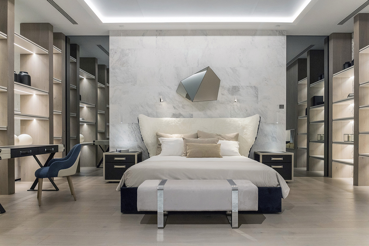 Modern bedroom with Rebeca bed and Traveler leather bedside tables.