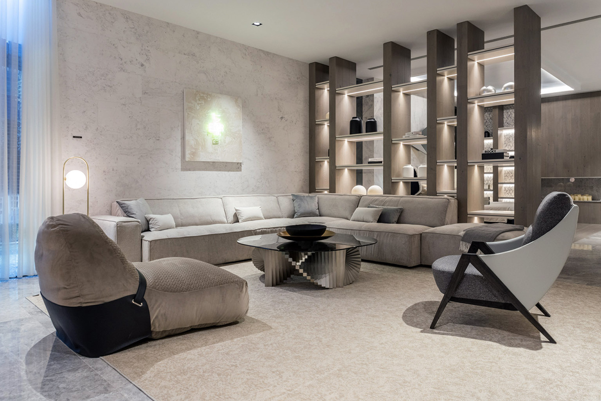 Contemporary living room designed for socialising while lounging on the Boston L-shaped sofa or the Falcon and Nido armchairs.