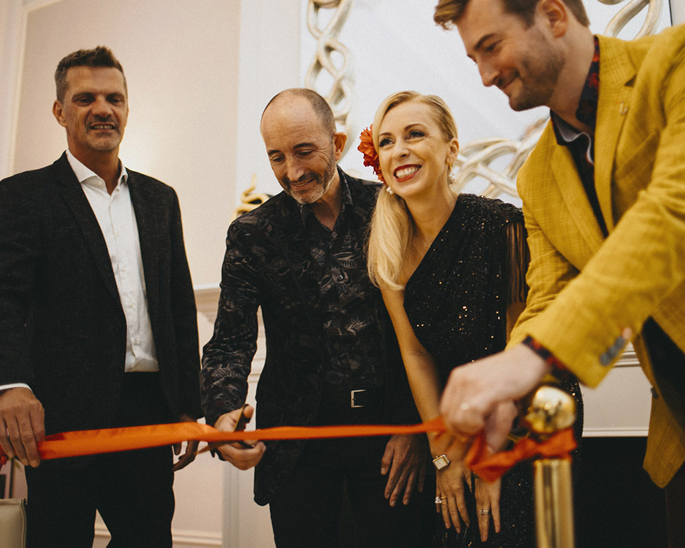 Johnny Ventura from Colección Alexandra with Beata and Adam from Dusek at the opening of the new Prague store